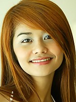 Asian girl with red hair loves to pose for the camera!